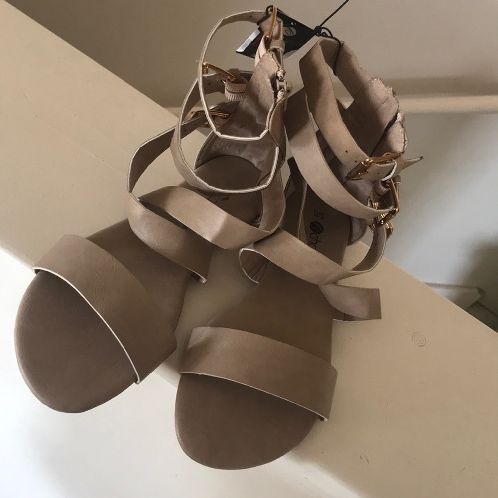 A pair of brand new tan chatties.